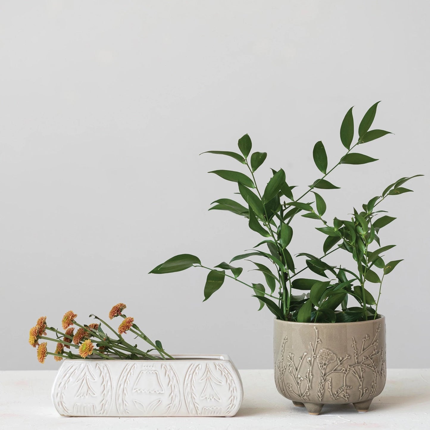 Embossed Stoneware Footed Planter with Floral Design